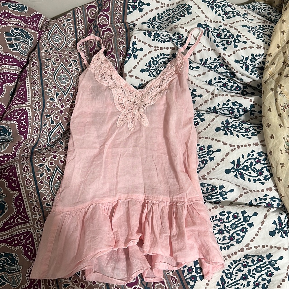 A pink peplum shirt